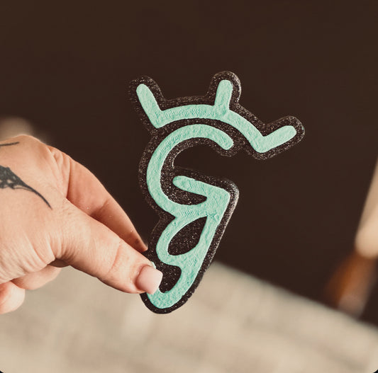 Glitter + Grit logo freshie